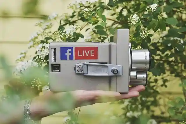 Video camera with Facebook logo and Live image on the side/Facebook Live concept