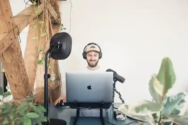 Man setting up to record a podcast