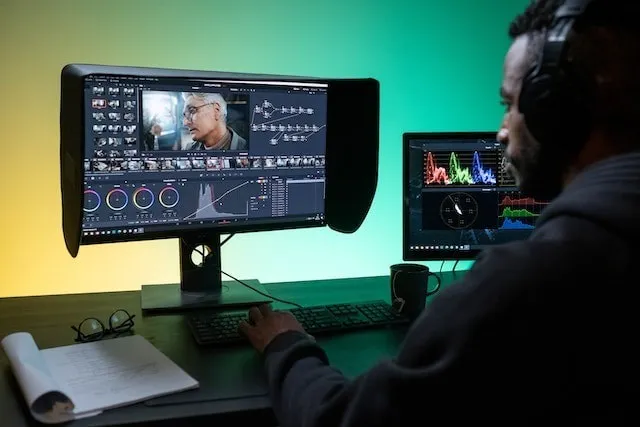 Man editing an Instagram Reel using video editing software